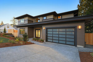 home with glass doors on the garage after mission viejo garage door repair